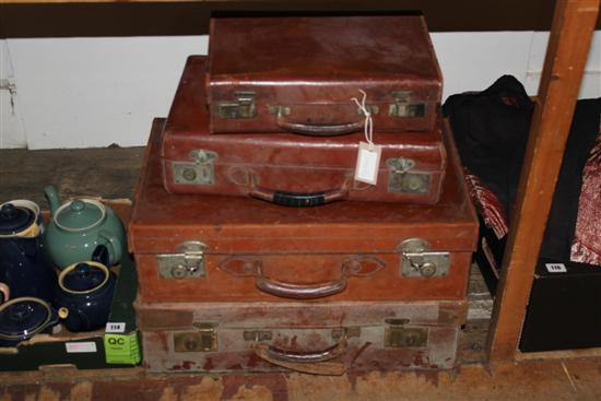 4 leather suitcases